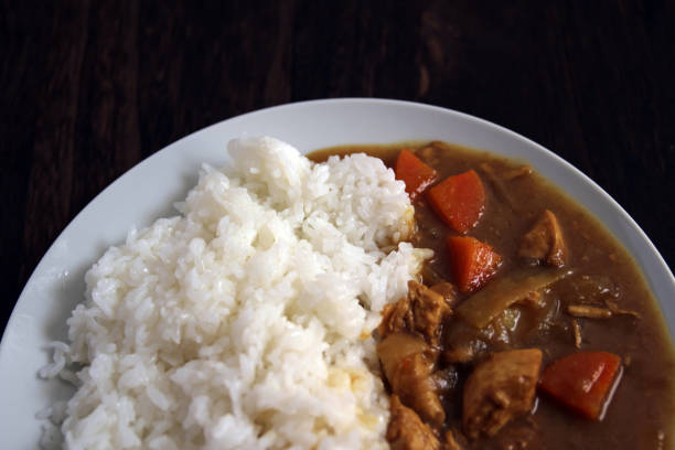 istock Curry rice served at a restaurant with a wooden table 1400020013