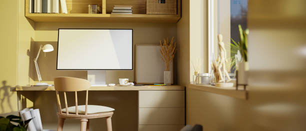 istock Modern home workplace interior design with pc desktop computer on table, near the window. 1400020196