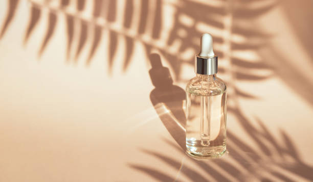 istock serum on a beige background with natural sunlight 1400020930