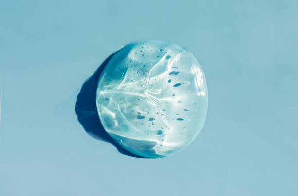 istock texture gel serum on blue background 1400020960