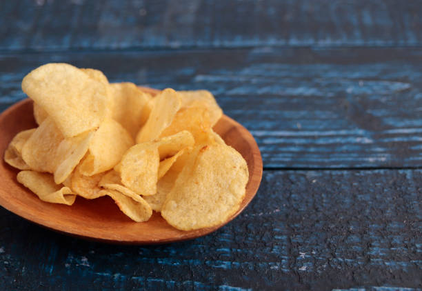 istock Calorie-rich blue table potato chips called mild drugs 1400022046