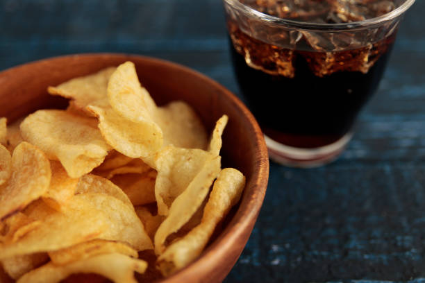 istock Calorie-rich blue table potato chips called mild drugs 1400022058