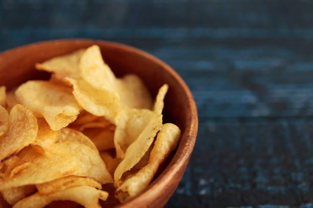 istock Calorie-rich blue table potato chips called mild drugs 1400022061