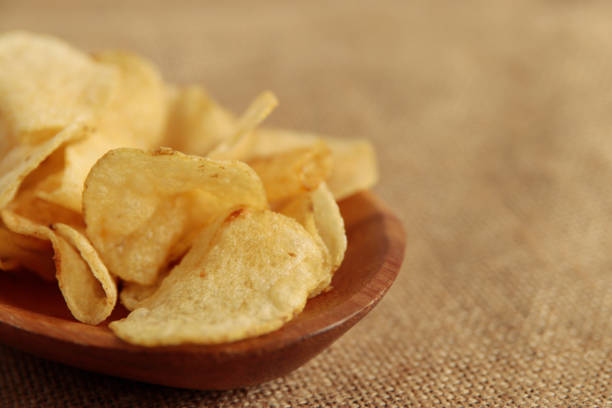 istock Calorie-rich blue table potato chips called mild drugs 1400022063