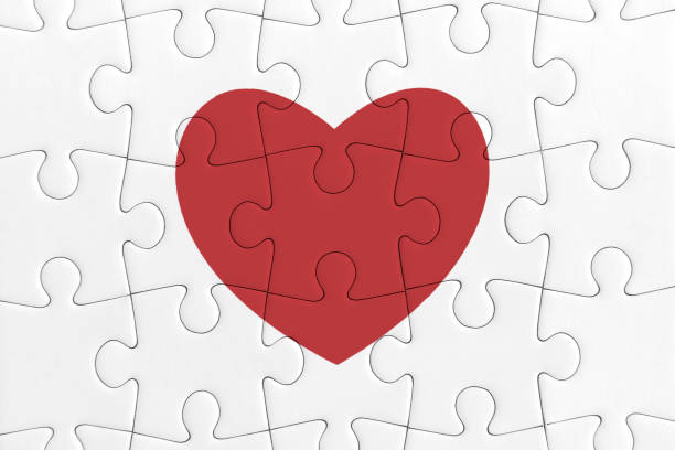 istock White closed puzzle with red heart 1400022078