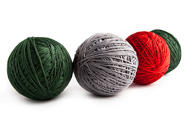 istock Colored balls of yarn, isolated on white 140002456