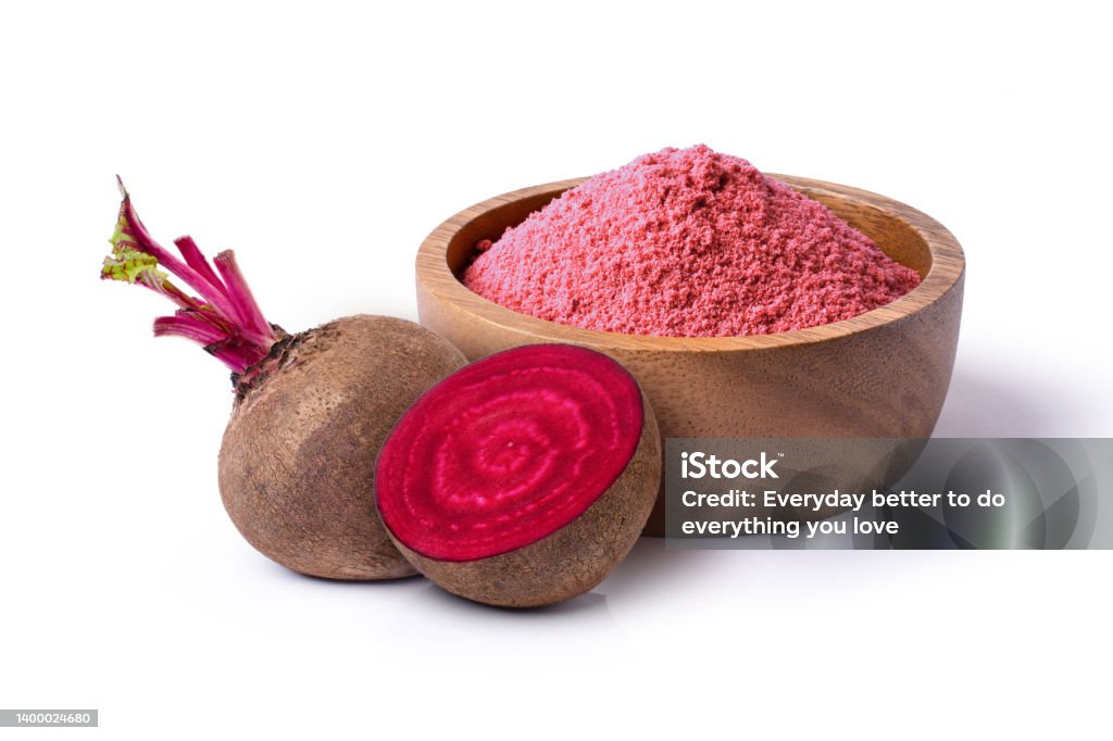 Beetroot (beet root) powder in wooden bowl with fresh fruit isolated on white Beetroot (beet root) powder in wooden bowl with fresh fruit isolated on white background. Ground - Culinary Stock Photo