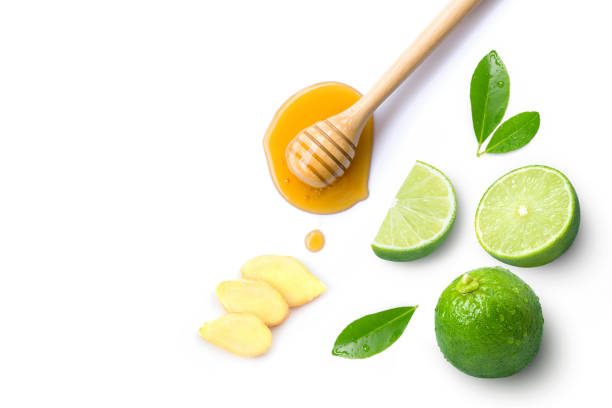 istock Ginger and lime with honey isolated on white background. 1400024750