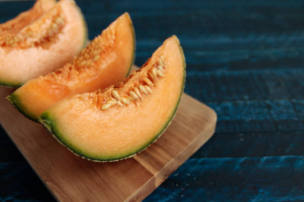 istock Cut a pumpkin-like melon on the table 1400025228