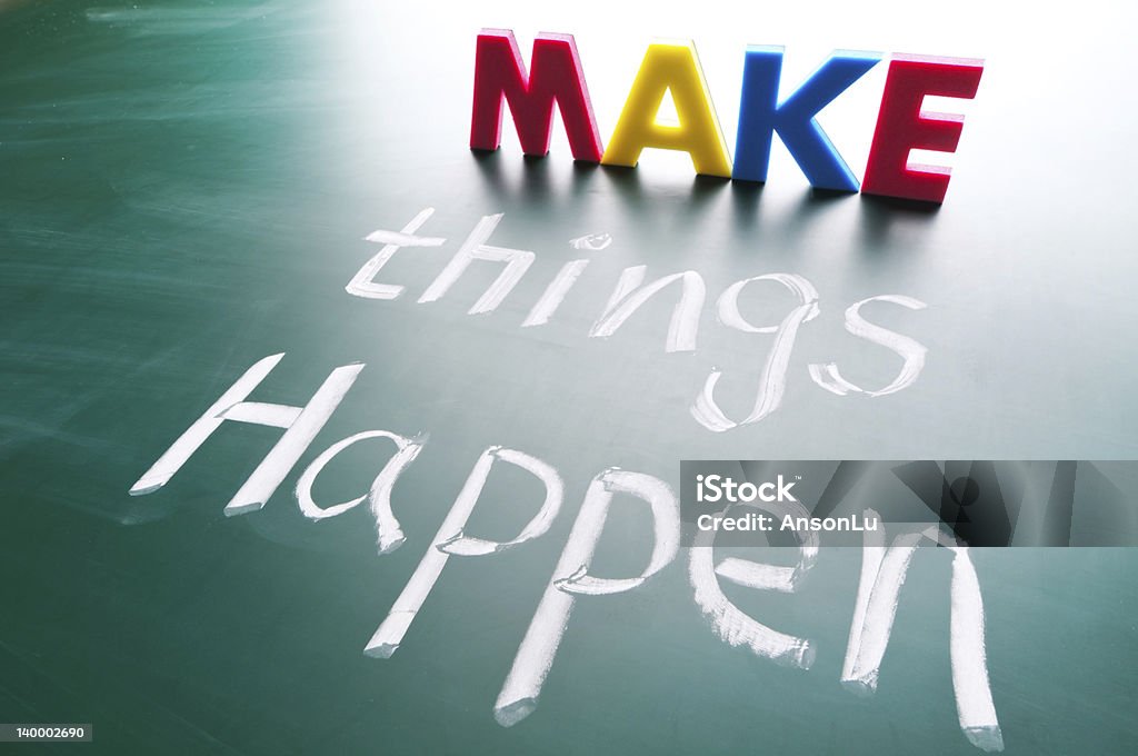 Concept words saying make things happen Make things happen, concept words draw on blackboard. Activity Stock Photo