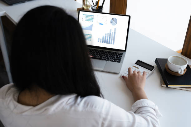 istock data analysis, budget calculation, research, risk management, portrait of Asian women using computers and financial documents in capital planning to increase company profits 1400027765