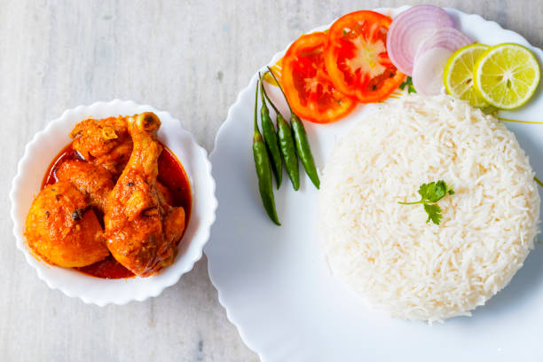 istock selective focus of Basmati Rice with salad and chicken curry. 1400028249