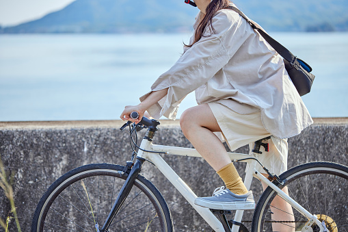 A  woman who enjoys cycling  herself