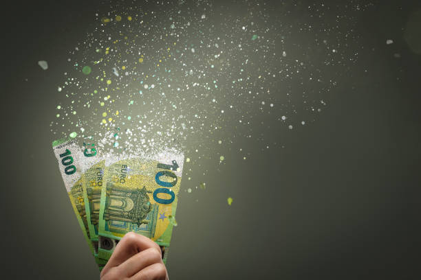 100 Euro bills vanish into thin air stock photo