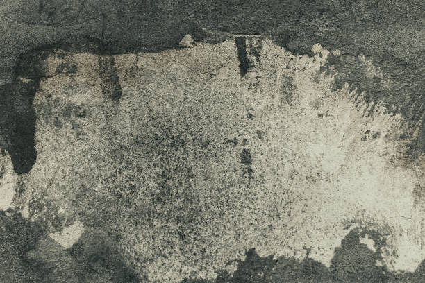 istock Abstract background, old concrete wall. A grunge cement texture with damages and cracks. 1400035995