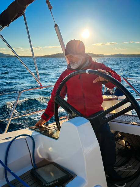 istock Skipper sailing on sailboat 1400040540