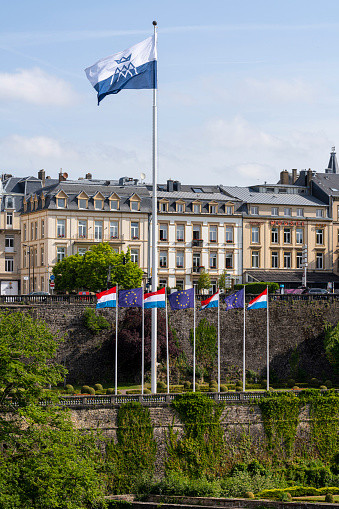 Luxembourg city, May 2022.  the flags of luxembourg and europe fly in the Petrusse park in the city center