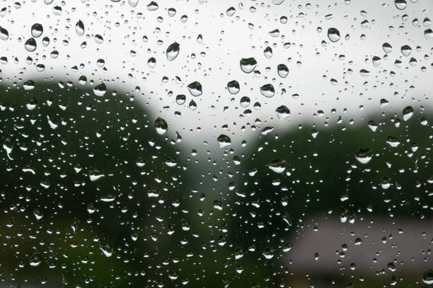 istock Rain drops on the car wind glass background. 1400042564