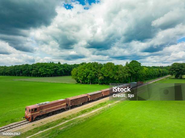 Old Diesel Freight Train In The Countryside Stock Photo - Download Image Now - Rail Freight, Freight Train, Netherlands