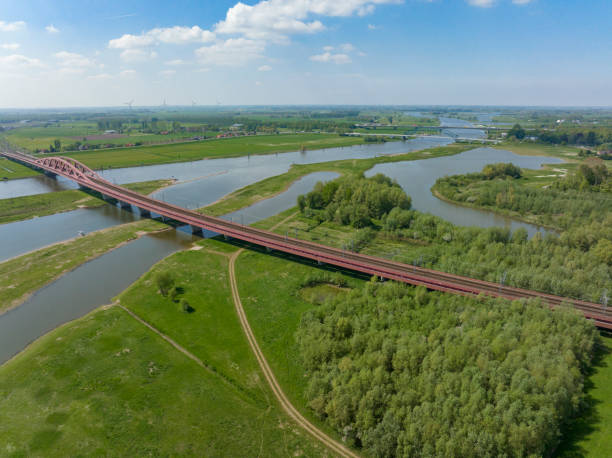 istock Hanzeboog train bridge over the river IJssel 1400043291