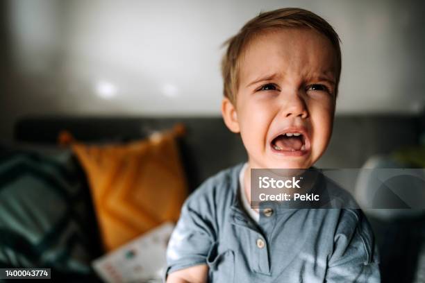 Crying Toddler Boy Stock Photo - Download Image Now - Shouting, Child, Bed - Furniture