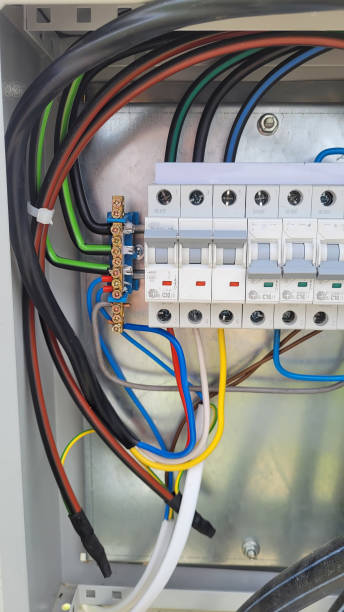 istock electricity distribution box with wires and circuit breakers fuse box. Selective focus. 1400044512