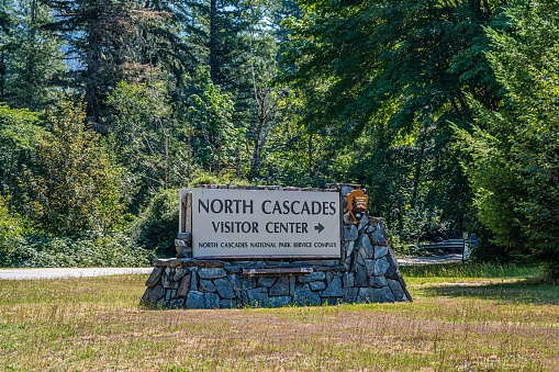 North Cascades NP, WA, USA - August 18, 2021: A welcoming signboard at the entry point of preserve park