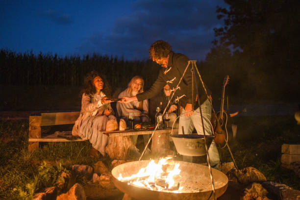 istock Mixed Race Friends Camping Together In Nature 1400047738