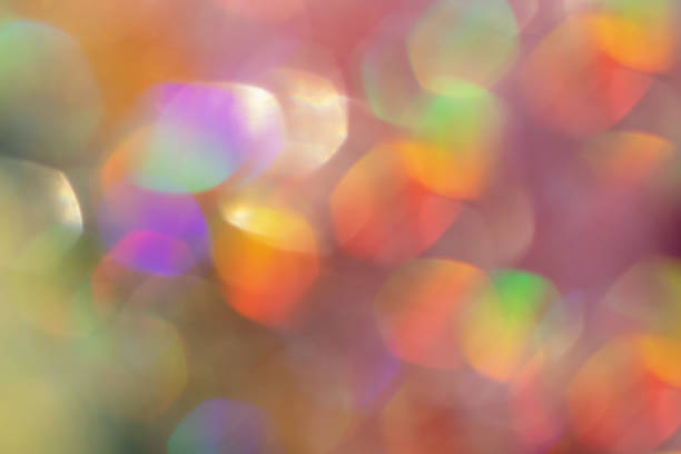 istock Abstract defocused multicolored background with shining glitter.Good as overlay layer. 1400047765