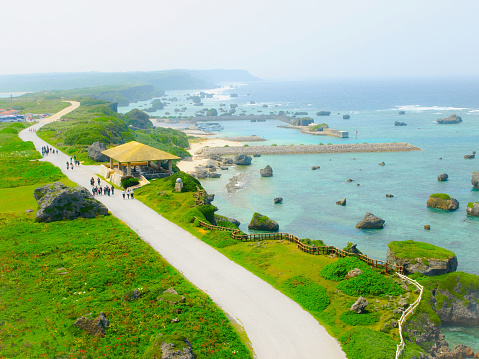 view to a amazing turquoise water and a coral reef with hills from the desert in egypt