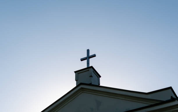 istock Cross on rooftop of Catholic cathedral 1400049451