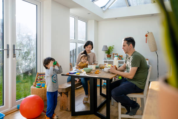 istock Family Enjoying Morning Breakfast 1400051344