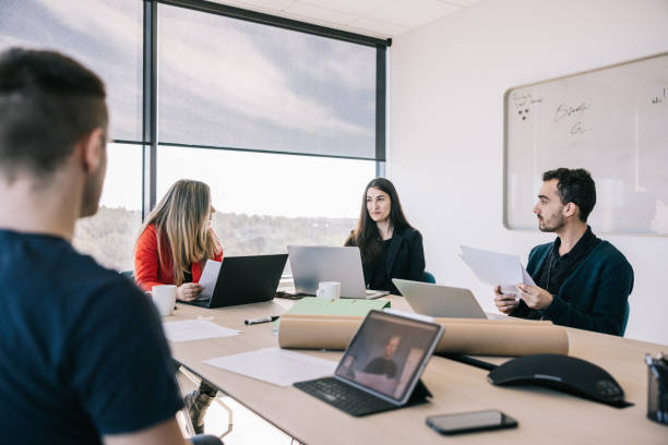 istock Business colleagues discussing strategy at office 1400051471