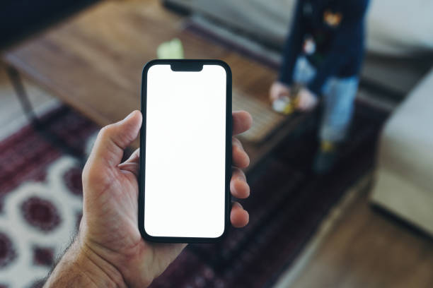 istock Smartphone mockup, internet of things and smart home concept, man using mobile phone 1400051836
