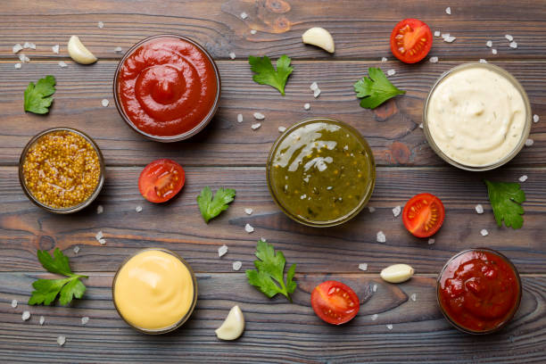 istock Many different sauces and herbs on table, flat lay top view. sauces with spices healthy concept 1400054844