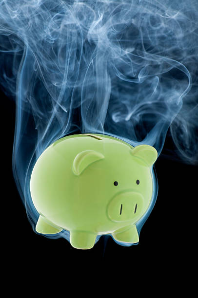 istock Smoking Piggy Bank 140005766