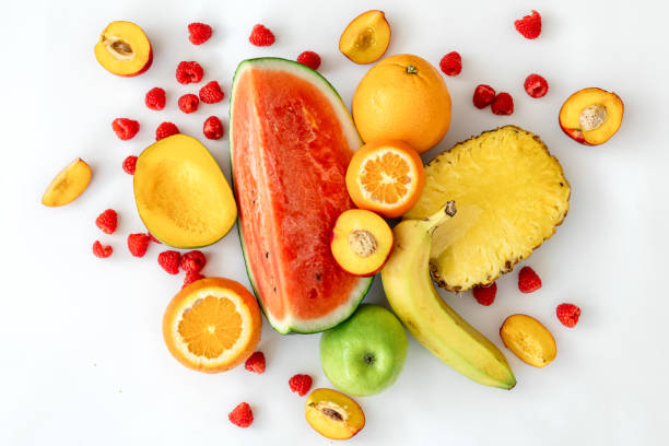 istock Tropical fruits on a white background top view. 1400058270