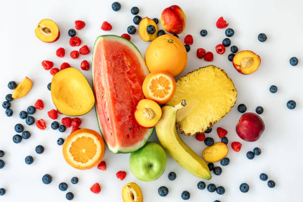 istock Tropical fruits on a white background top view. 1400058280