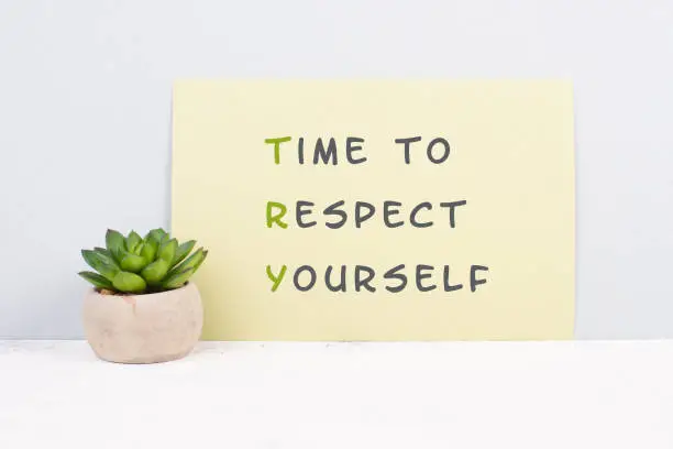 Photo of The words time to respect yourself are standing on paper, responsibility and development, motivation concept, cactus plant beside the message