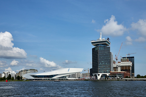 A'DAM Tower and EYE Film Museum waterfront skyline on a summer day, Amsterdam Noord, The Netherlands.