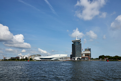 A'DAM Tower and EYE Film Museum waterfront skyline on a summer day, Amsterdam Noord, The Netherlands.