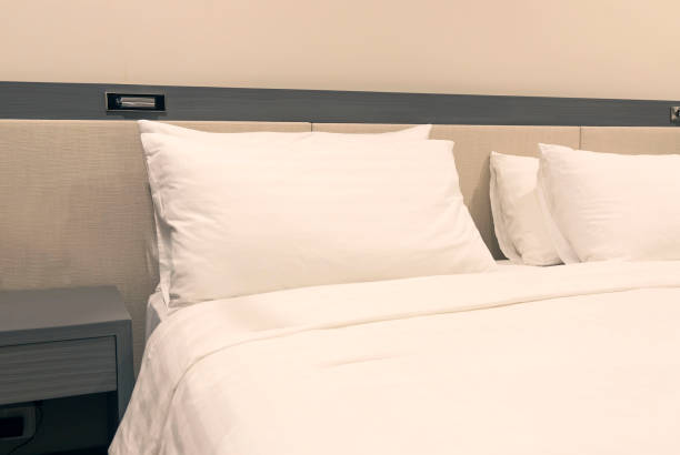 istock Selective focus of  white pillow which Modern bedroom interior with a stylish combination of trendy room image 1400060673