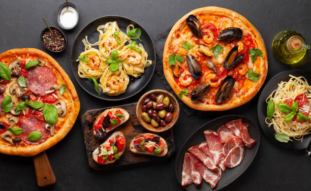 istock Italian cuisine. Pizza, pasta and toasts 1400064102