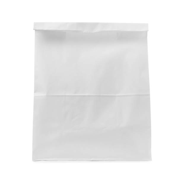 istock Closed paper grocery bag isolated on white 1400065029