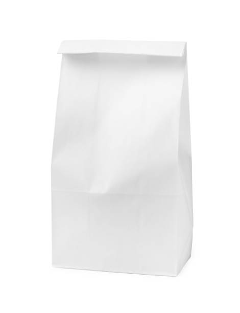 bolsa de supermercado de papel cerrada aislada sobre blanco - shopping bag white isolated blank fotografías e imágenes de stock