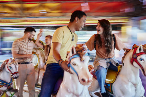 istock Merry-go-round carousel ride in blurred motion! 1400065212