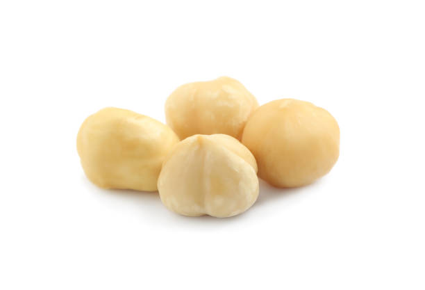 istock Tasty organic hazelnuts on white background. Healthy snack 1400065336
