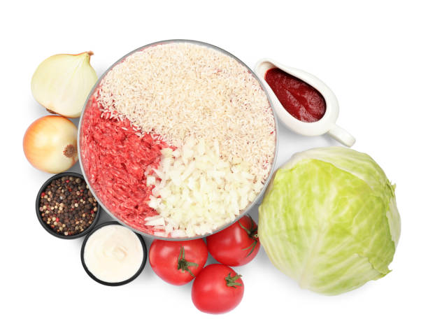 istock Set of ingredients for preparing stuffed cabbage rolls isolated on white, top view 1400065455