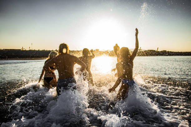 istock Fun in the sea at sunrise! 1400067105