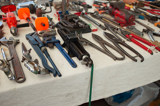 Old metal tools wrench, key, pliers at flea market in Bodrum, Turkey.
